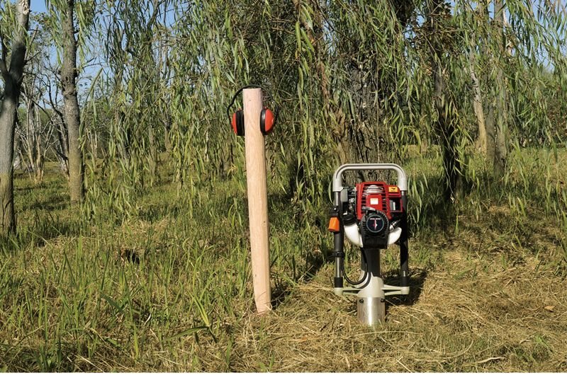 Fencing & livestock – petrol post driver at work