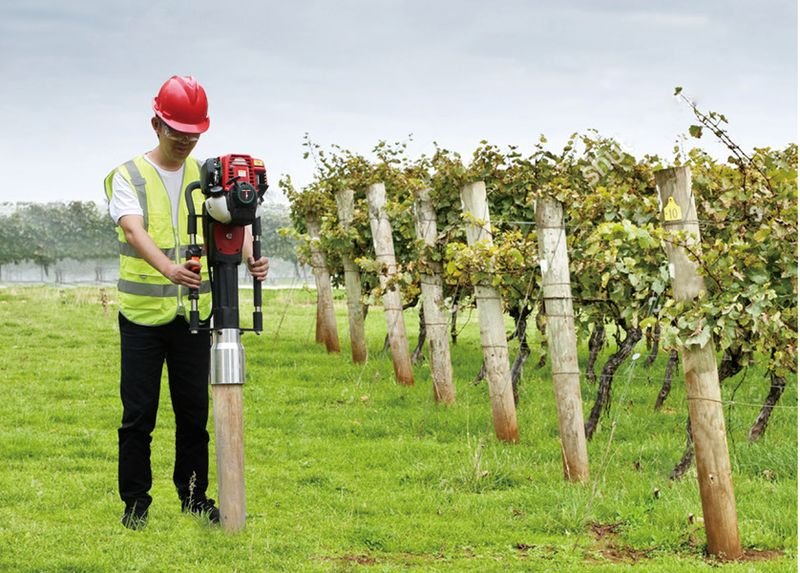 Vineyards & orchards – petrol post driver at work